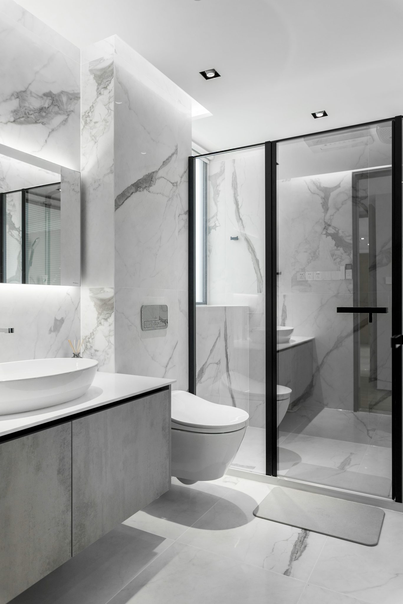bathroom-with-shower-toilet-with-glass-door-min